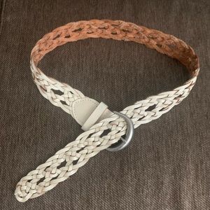 Cream belt fits size 24. Measures 34inches long.